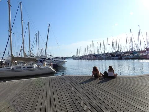 Sitting on the the boat dock Stock Photos