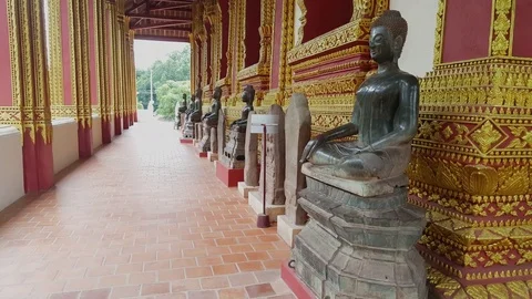 Sitting Buddha statues at pavilion wall, Haw Phra Kaew Temple, Vientiane, Laos Stockbeeldmateriaal 75553647