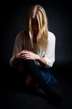 Sitting in the dark Stock Photos