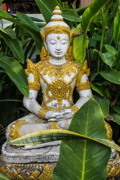 Sitting deva statue Stock Photos