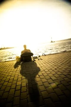 SITTING ON THE DOCKS 스톡 사진