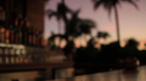 Sitting Down at the bar with a Drink - Sunset Stock Footage 34818351