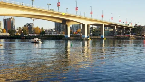 Sitting on the edge of Fraser river in a beautiful park 스톡 동영상 144465067