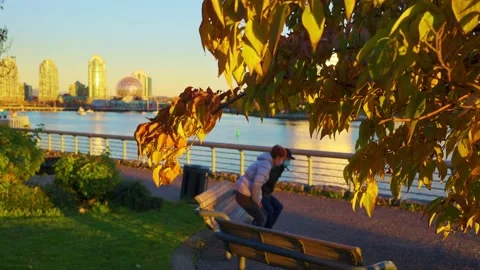 Sitting on the edge of Fraser river in a beautiful park Видео 144465826