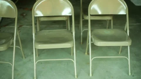 Sitting at event sit down chair chairs Stock Footage 12456756