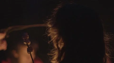 SITTING IN FRONT OF CAMPFIRE Stock Footage 68906838