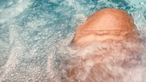 Sitting in the jacuzzi Stock Footage 127415601