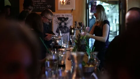 Sitting in a luxury bar authentic atmosphere, high-quality alcoholic beverages Stock Footage 73819092