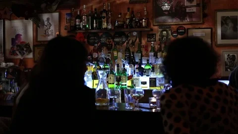 Sitting in a luxury bar authentic atmosphere, high-quality alcoholic beverages Video stock 73922839