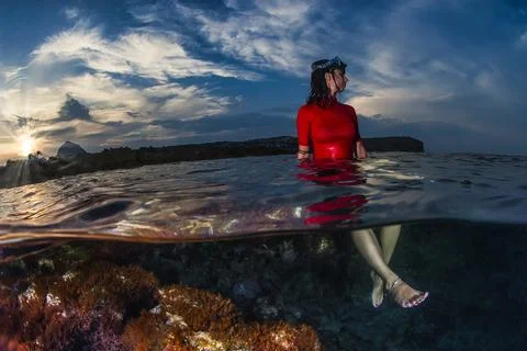 Sitting in a Mediterranean reef at sunset Stock Photos