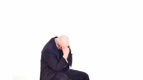 Sitting middle age man thinking about problem white screen Stock Footage 105917656