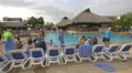 Sitting near the pool and swimming at Playa Blanca Resort, Panama 4k or 4k+ Resolution