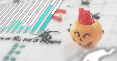 Sitting orange jack-o'-lantern on right side of printed sheet, with red filler Stock Photos