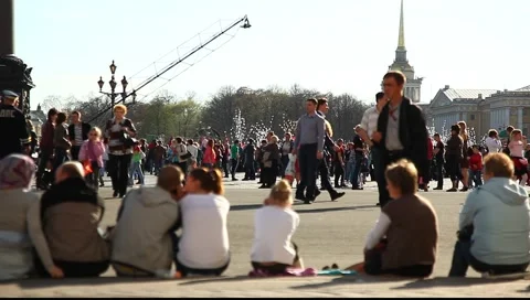 Sitting people. Crowd from pedestrians on the background 動画素材 5671105