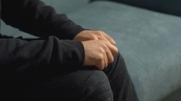 Sitting by the psychologist: hands of a tense and anxious patient Stock Footage 85690347