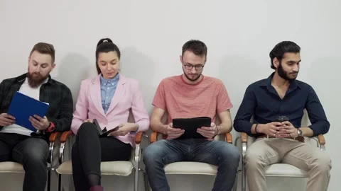 Sitting queue before the job interview in the office Stock Footage 131952484