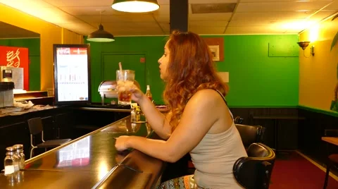 Sitting at restaurant looking at camera Video stock 50542013