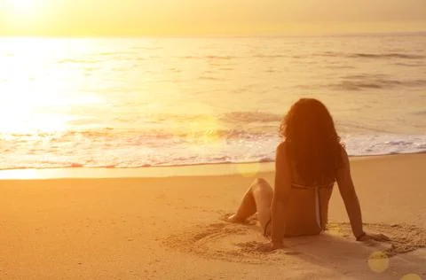 Sitting in the Sand Stock Photos