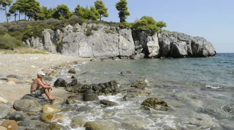 Sitting by the sea Stock Footage 45385236