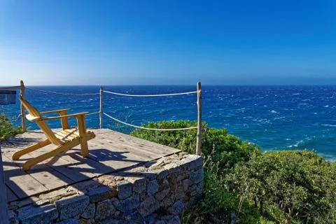 Sitting by the sea Stock Photos