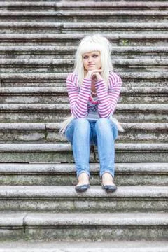 Sitting on stairs Stock Photos