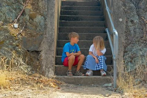 Sitting on the steps Stock Photos