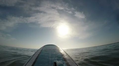 Sitting on a surf board Vídeo Stock 53176701
