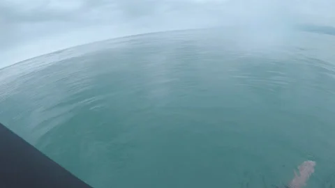 Sitting on Surf Board POV HD Stock Footage 175961995