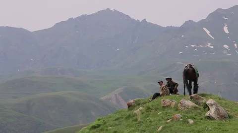 Sitting on top of a hill Stock Footage 77648855