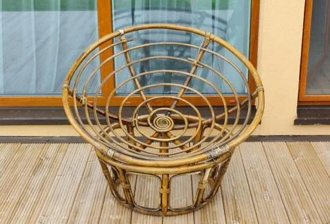 The sitting weaved from rods Stock Photos