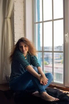 Sitting on the window Stock Photos