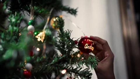 Sitting woman's hands holding a Christmas tree doll Stock Footage 253785053