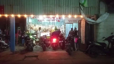 The situation in front of the vegetable shop at night Stock Footage 157086361