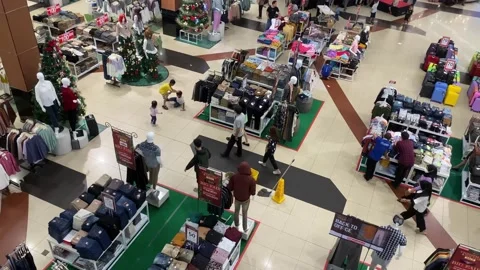 The situation or activity of shopping area. people walking around in the mall Stock Footage 228840349