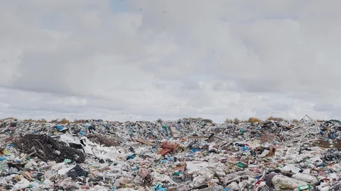 Сity garbage dump, environmental pollution due to lack of recycling technology Stockbeeldmateriaal 97695084