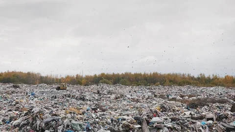 Сity garbage dump, environmental pollution due to lack of recycling technology Stockbeeldmateriaal 97695611