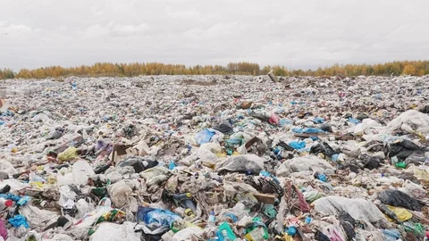 Сity garbage dump, environmental pollution due to lack of recycling technology Stockbeeldmateriaal 97696091