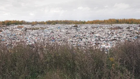 Сity garbage dump, environmental pollution due to lack of recycling technology Stockbeeldmateriaal 97696144