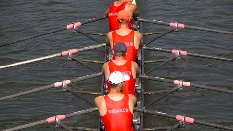 Сity rowing canal. Athletes in training. Slow motion. Stock Footage 78980239