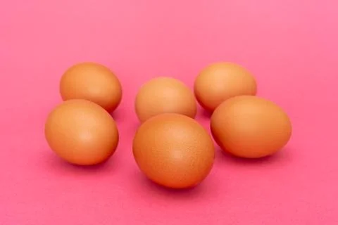 Six brown eggs Stock Photos