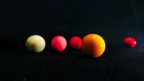 Six colored billiard balls all together entering the frame Stock Footage 247299794