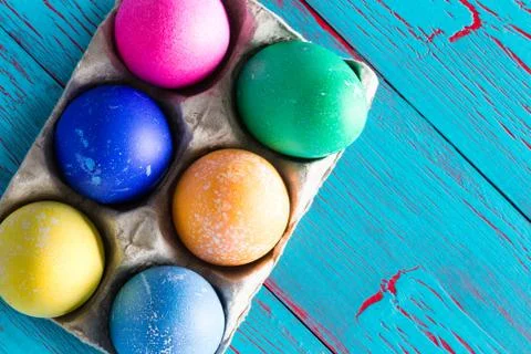 Six colored dyed Easter eggs with copy space Stock Photos