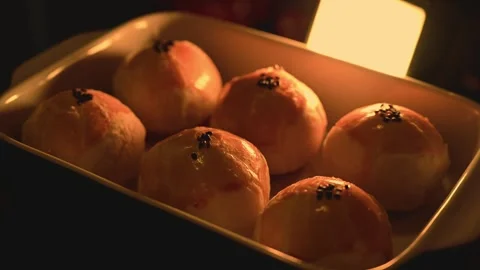 Six Egg Yolk Pastries in a Ceramic Baking Dish with Warm Light Vídeos de archivo 345669774