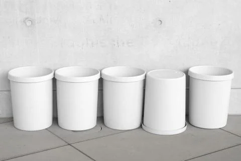 Six empty trash cans Foto stock