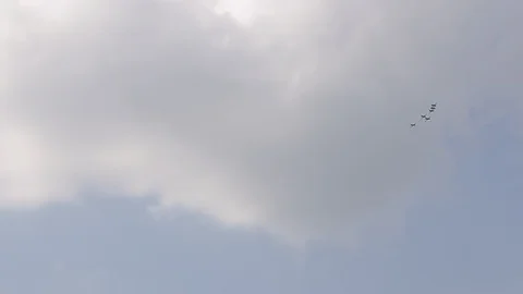 Six fighter jets in the blue sky. A general plan. Aerobatic figures. Airshow. 10 Stock Footage 124143410