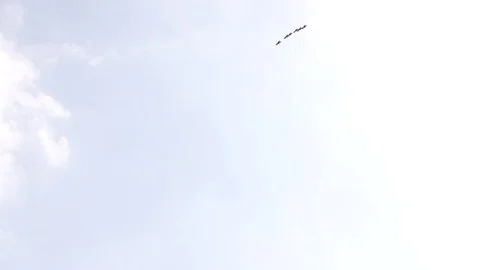 Six fighter jets in the blue sky. A general plan. Aerobatic figures. Airshow. 10 Stock Footage 124146034