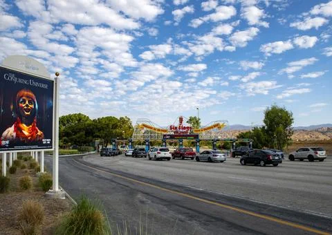 Six Flags Magic Mountain amusement park entrance Extreme Conjuring Universe sign Stock Photos
