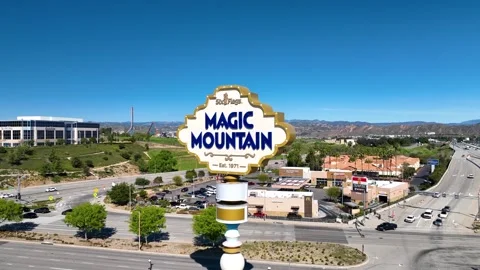 Six Flags Magic Mountain Sign Push in angle Stock Footage 304828074