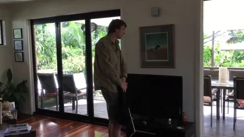 Six-Foot Carpet Python Under TV, Noosa, Queensland, Australia - 18 Mar 2018 Stock Footage 205257534