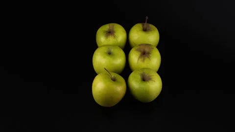 Six fresh green apples on a black background 스톡 동영상 331661413